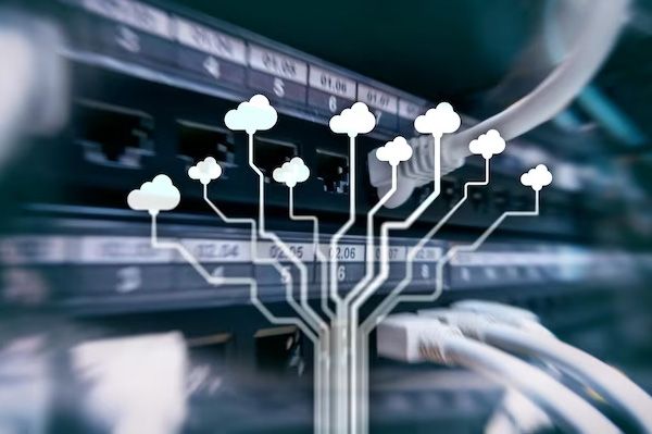 Network cables branching into cloud icons